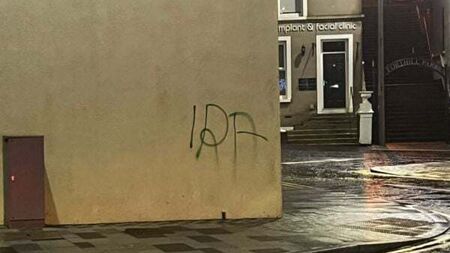 Daubing of IRA graffiti close to Enniskillen bomb memorial condemned