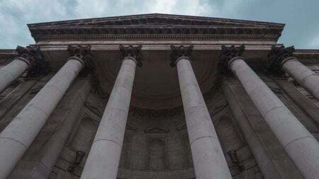 Pub doorman tells High Court that spinal injury was caused by drunk customers