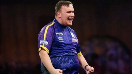Luke Littler continues dream World Championship with victory over Andrew Gilding