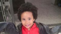 Mother accused of killing her Irish son (4) sobs in court