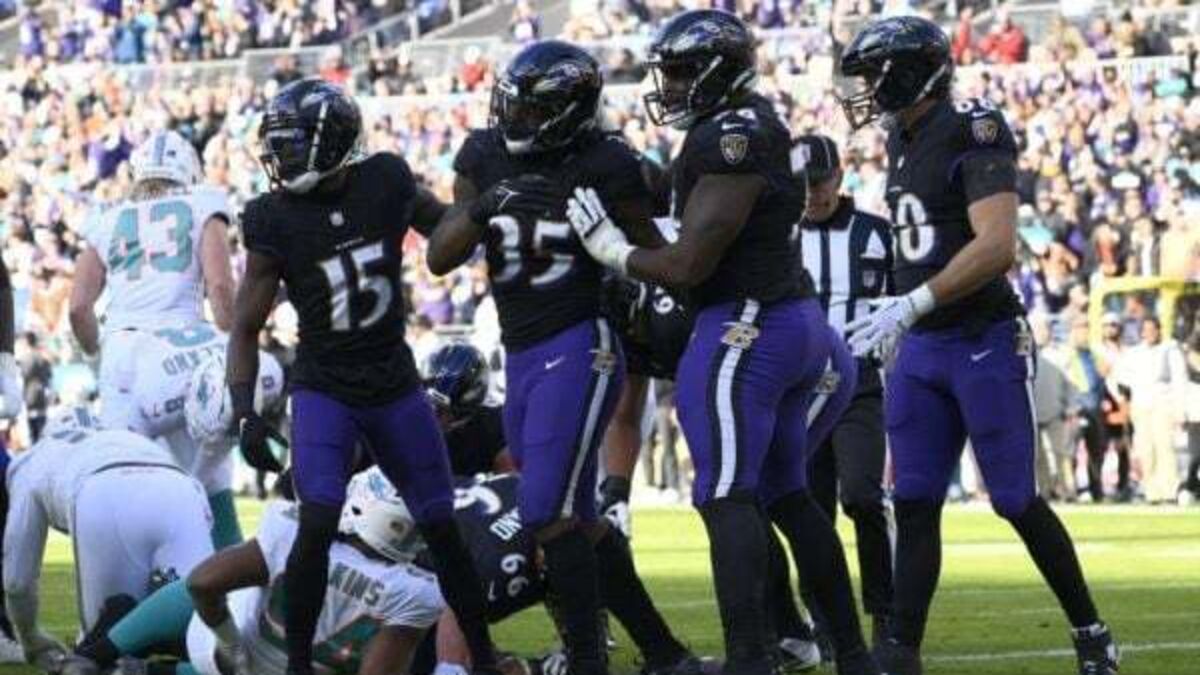 Baltimore clinch AFC North title and top seed in play-offs with Miami mauling