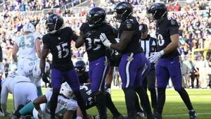 Baltimore clinch AFC North title and top seed in play-offs with Miami mauling