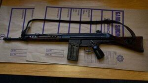 Three men charged in firearms trafficking probe Three men charged in firearms trafficking probe