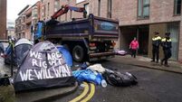 Donohoe defends Government’s decision to move asylum seekers from Dublin ‘tent city’