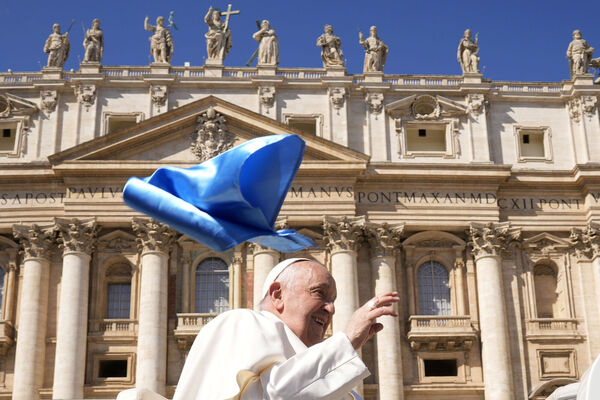 Pope Francis smiles as he waves faithful at the end of his weekly general audience in St. Peter's Square, at the Vatican. Photo/Andrew Medichini)