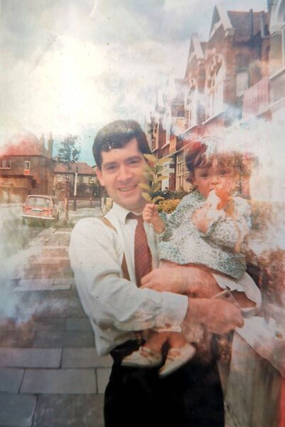 Jim Corcoran holding his daughter Jacqui
