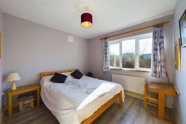 One of the bedrooms in the house