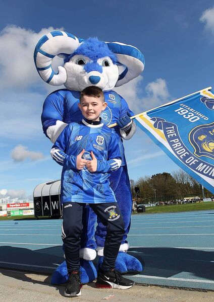 Waterford FC mascot Oscar Broderick from St. Joseph’s FC. pictured with Waterford team mascot Bilberry Goat. Waterford FC mascot Oscar Broderick from St. Joseph’s FC. pictured with Waterford team mascot Bilberry Goat.