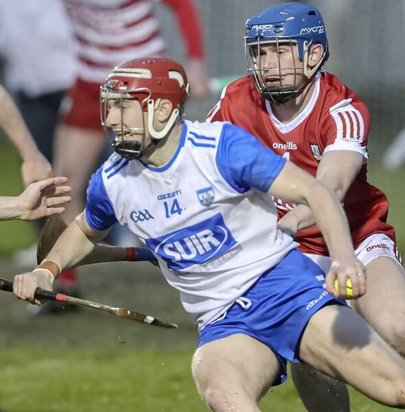 Waterford's Patrick Fitzgerald in possession against Cork's Darragh O’Sullivan. Waterford's Patrick Fitzgerald in possession against Cork's Darragh O’Sullivan.