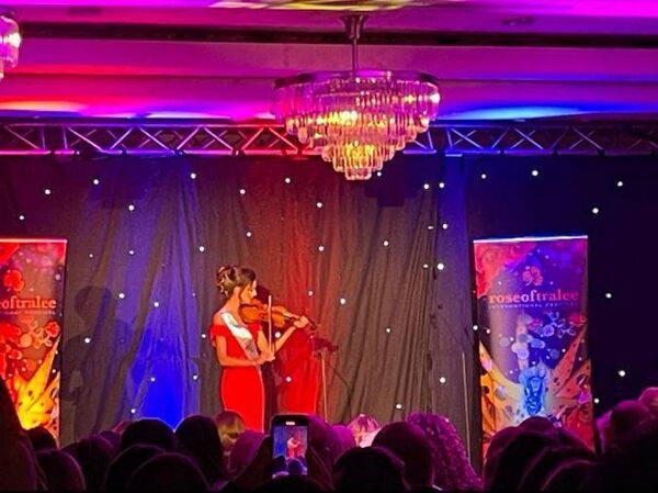 Abby Walsh playing the fiddle at the Rose of Tralee Waterford Selection 2024.