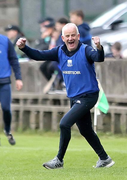 Waterford manager Jerry Wallace celebrating the win .