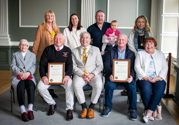 From left are seated, Agnes Carey, Francis Carey, Metropolitan Mayor Jody Power, Brendan Carey and Pattie Carey, back, Janet Carey, Clodagh, Paddy and Leah Carey and Laura Carey. 