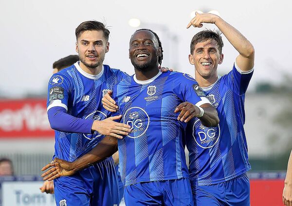 Waterford FC's Christie Pattisson celebrates with team mates Grant Horton and Dean McMenamy after scoring in the second- half.