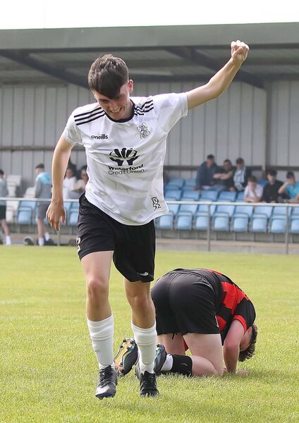 Tramore's Sean Fitzgerald celebrates after opening the scoring for his side. Tramore's Sean Fitzgerald celebrates after opening the scoring for his side.