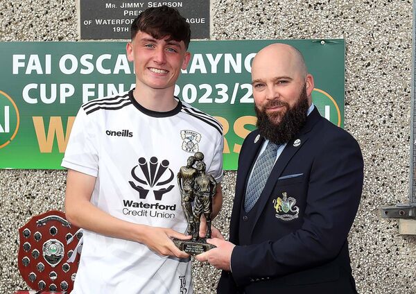 Waterford Junior League Vice Chairman Paddy Byrnes is pictured presenting the Man of the Match award to Tramore's Sean Fitzgerald. Waterford Junior League Vice Chairman Paddy Byrnes is pictured presenting the Man of the Match award to Tramore's Sean Fitzgerald.