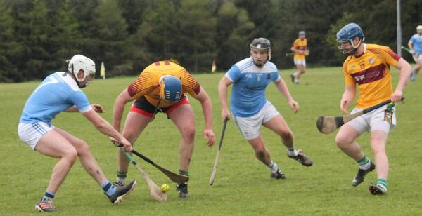 Sam Pender (St. Mary's) prevents a Mike Kearns(St. Mary's) pick up with Sean Burke (Roanmore) and Conor Tobin(St. Mary's) 