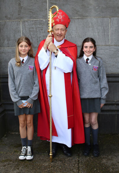 Waterpark students Pola Starosciak and Kayla McGee, who were Confirmed by Bishop Alphonsus Cullinan at St. John's Church.
