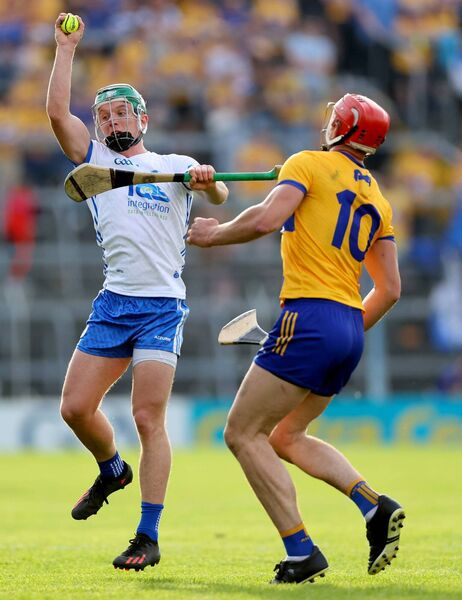 Waterford’s Jack Prendergast wins a good catch against Peter Duggan of Clare when the sides met in the 2023 Munster SHC in Thurles. On Sunday it'll all systems go between the counties in Cusack Park in Ennis. Photo: Inpho/James Crombie.