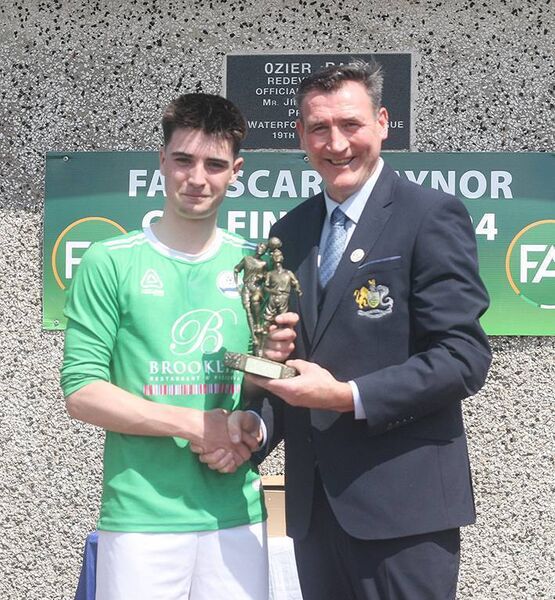Brendan Rea of the WDJL presents Ryan Connell with his Man Of The Match award. Brendan Rea of the WDJL presents Ryan Connell with his Man Of The Match award.