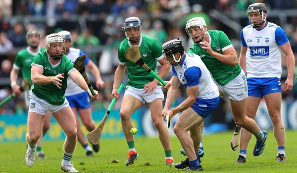 Waterford's Jamie Barron is swamped by Limerick players during Sunday's Munster SHC clash. Waterford's Jamie Barron is swamped by Limerick players during Sunday's Munster SHC clash.