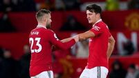 Luke Shaw and Harry Maguire join England camp early in bid to prove fitness