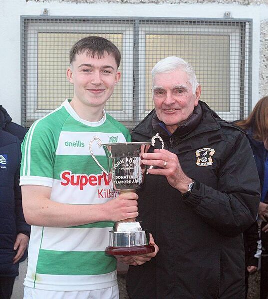 John Power of Tramore presents the John Power U16A Cup to Villa captain Darragh O'Connor at Graun Park. John Power of Tramore presents the John Power U16A Cup to Villa captain Darragh O'Connor at Graun Park.