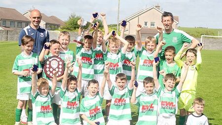 Coffey double steers Villa to cup triumph