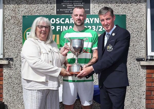 The Philip O'Keeffe Division 3 Cup was presented to the winning captain, Carrick United's Robbie Power by Mary O'Keeffe and Colin Power, Waterford &amp; District Junior League.