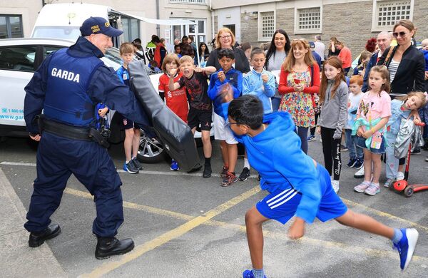 Deric with Garda Iain O'Byrne, at the Waterford Garda Open Day. Photo: Joe Evans Deric with Garda Iain O'Byrne, at the Waterford Garda Open Day. Photo: Joe Evans