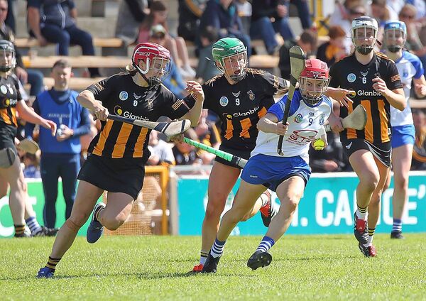 With gritted teeth Waterford's Lorraine Bray gets away from Kilkenny's Laura Greene and Laura Murphy.