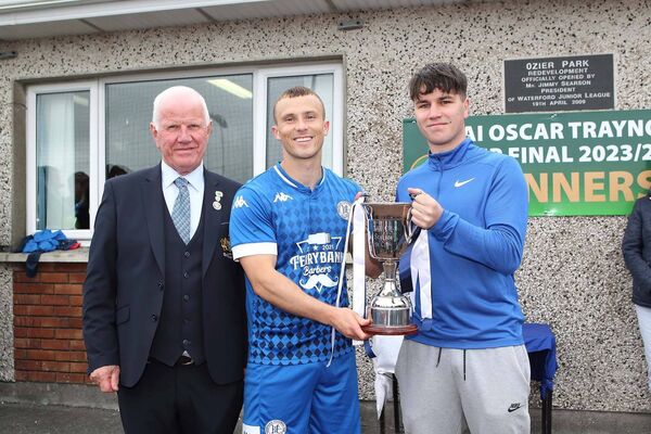 The Jimmy Season Premier Cup was presented to Hibernian's FC captain David Cooley by James Searson, grandson of the late Jimmy Searson and Waterford & District Junior League's John Foskin. The Jimmy Season Premier Cup was presented to Hibernian's FC captain David Cooley by James Searson, grandson of the late Jimmy Searson and Waterford & District Junior League's John Foskin.