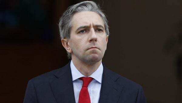 Masked protesters cleared by gardaí after gathering outside Taoiseach's family home