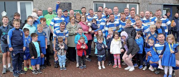 The Stafford family made the Matt Stafford Div. 4 Cup presentation to St. Joseph’s captain Shane O'Brien surrounded by his team-mates and supporters at Ozier Park. Photos: Noel Browne.