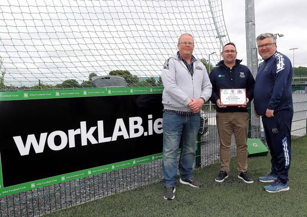 Ger Murphy and Adrian Flanagan from the Waterford & District Junior League made a presentation to Villa FC Chairman, Shane Kehoe to mark the occasion of opening of WorkLab Connors Park. Ger Murphy and Adrian Flanagan from the Waterford & District Junior League made a presentation to Villa FC Chairman, Shane Kehoe to mark the occasion of opening of WorkLab Connors Park.