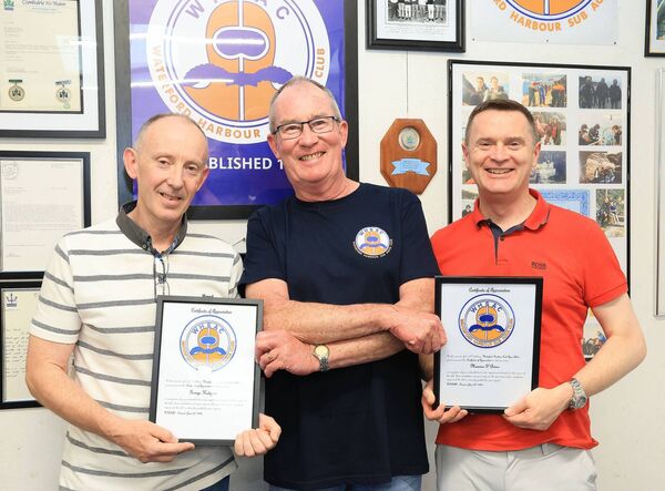 Mick Leavy, Chairperson, presenting certificates to George Hodgson and Maurice O'Brien, who helped with securing the loan for the new club. Mick Leavy, Chairperson, presenting certificates to George Hodgson and Maurice O'Brien, who helped with securing the loan for the new club.