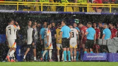 Germany-Denmark clash resumes after it was suspended due to torrential rain and thunder storm