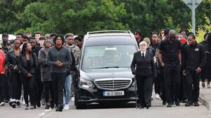 Gilbert Collins laid to rest after an emotional service