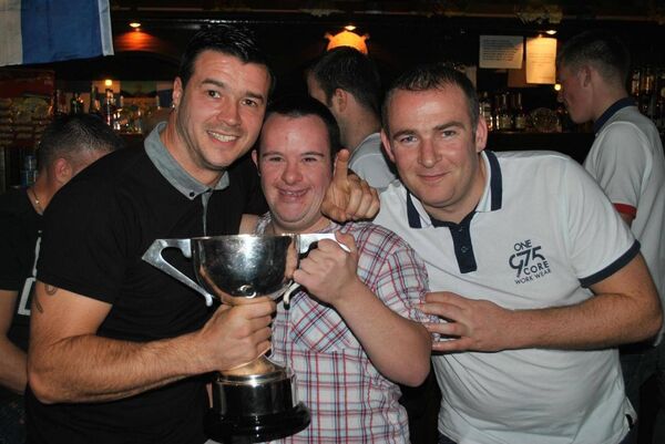 The late Michael Grant (left) pictured with John Flynn and Ruairi Sheridan after Mount Sion won the Junior A Football final at number of years back. 