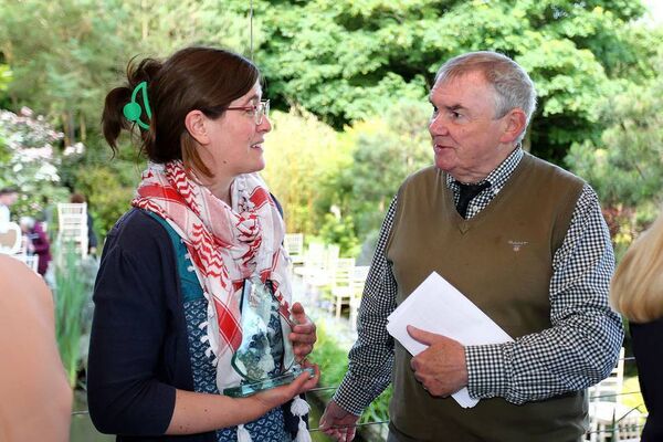 The winner of the Sean Dunne Poetry competition Giada Gelli is pictured chatting with judge Thomas McCarthy.