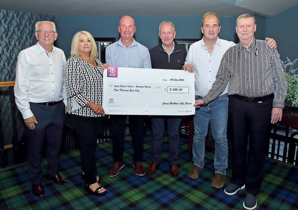 Ruth Carberry and Alan Barry from Cystic Fibrosis Ireland, Waterford Branch accepting a cheque for €3,000 from the organisers of the Johnny Matthews Golf Classic, included were Cllr.Joe Kelly, Metropolitan Mayor, Stan Bergin, Jim Kealy and sponsor John O’Donohoe.