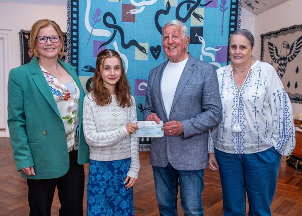 Dance artist, Holly Hughes receiving her Bursary Award from Bertie Rogers, also included are Mary O'Neill and Jenny Hughes. Photo: Maurice Hennebry 