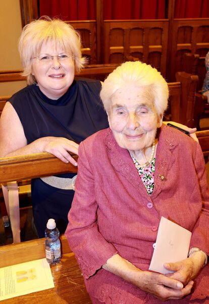 Catherine Kavanagh with her Godmother Mary Power who received the Papal award the Benemerenti Medal at a Mass of Thanksgiving, at the sacred Heart Church, Dunhill in recognition of Mary's 48 years service to the church. Photo: Joe Evans