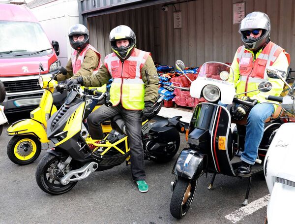 Some of the scooterists who took part in the Dave Scanlon Memorial Rideout, with all the proceeds going to the Palliative Care Team at UHW. Photo: Joe Evans