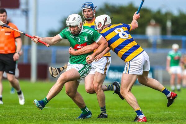 Ferrybank's Mark O'Brien is tackled by Abbeyside's Maurice Power