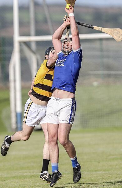 Dungarvan's Colm Curran makes a fine catch against Lismore's Ray Barry.