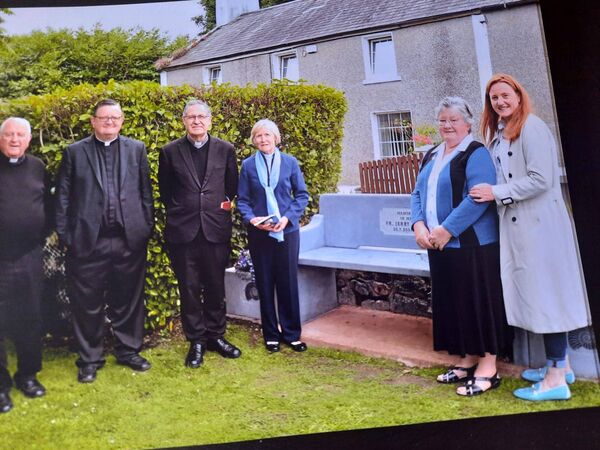 Pictured (l-r): Michael Enright, Monsignor Joe Corbett (USA), Fr Edmond Cullinan, Rev Jenny Crowley, with Fr Condon's sister, Sr Maureen and niece Alison, at the memorial bench. Pic: Colette Lenihan. Pictured (l-r): Michael Enright, Monsignor Joe Corbett (USA), Fr Edmond Cullinan, Rev Jenny Crowley, with Fr Condon's sister, Sr Maureen and niece Alison, at the memorial bench. Pic: Colette Lenihan.