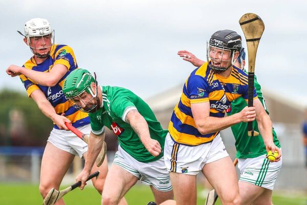 Abbeyside's Daire Slevin is tackled by Ferrybank's Graham Coady. Next up for Daire and his team-mates is a meeting with Fourmilewater. Photo: Maurice Hennebry.