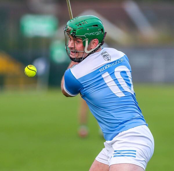 Roanmore's Gavin O'Brien in action against Clonea.