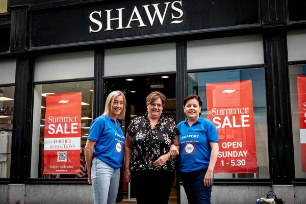 Niamh Cunningham of Shaws Dungarvan with Phil and Karen