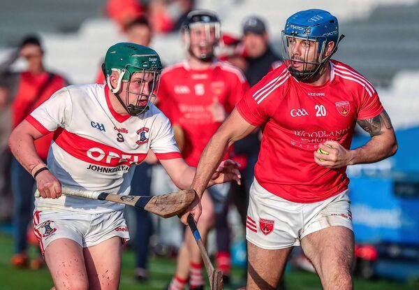 Passage's Owen Connores is tackled by De La Salle's Conor Keane. Passage's Owen Connores is tackled by De La Salle's Conor Keane.